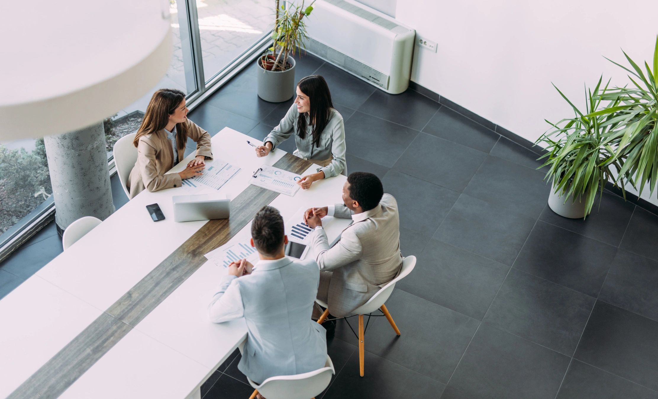 Business team collaborating during a staffing strategy meeting