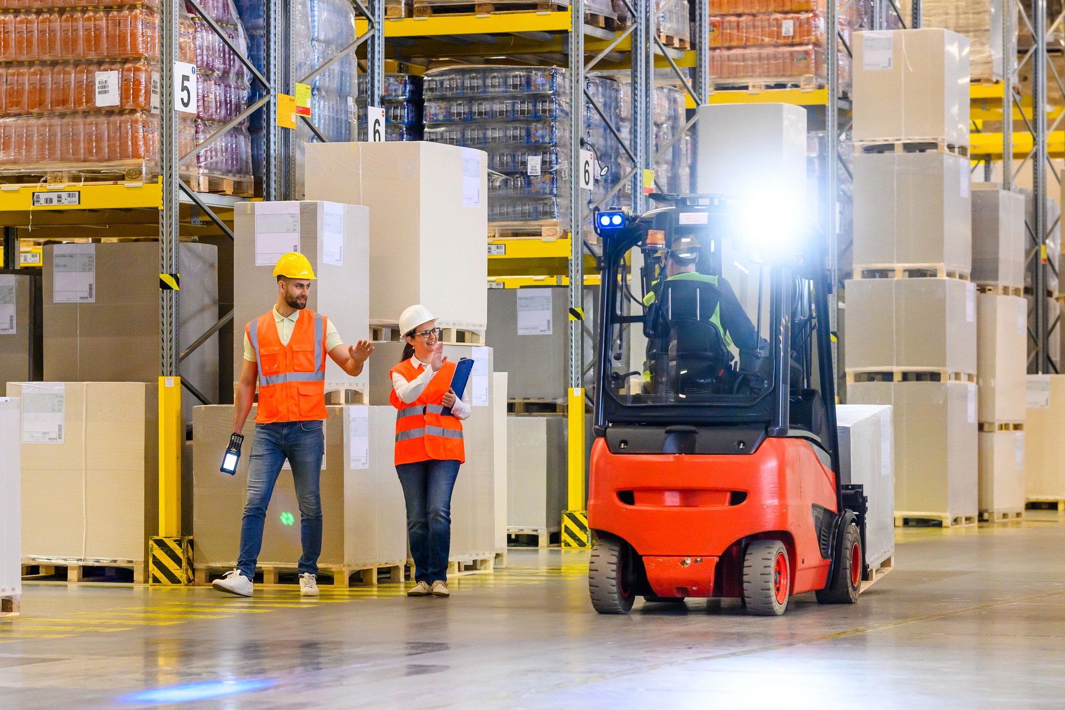 Warehouse team coordinating inventory operations